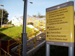 Looking up the stairs to the platform for trams to Bury coming from Middleton Road
