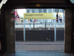 Looking out from the bridge over to Deansgate National Rail station, the platform for trams to Piccadilly, Bury and Oldham Mumps is in the background