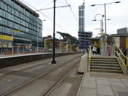 The platforms from the side of the one for trams via/to Victoria