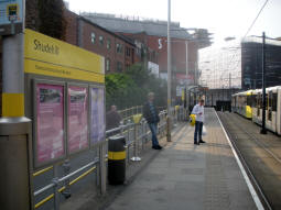 Looking along the platform for trams via Victoria