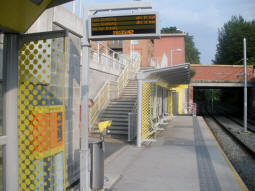 Looking along the platform for trams to East Didsbury